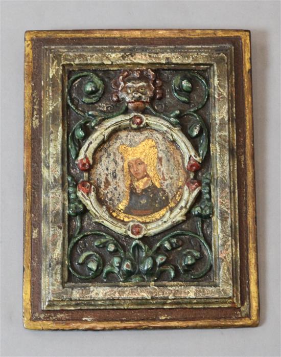 A 16th century French carved and polychrome painted wood panel, 11 x 8in.